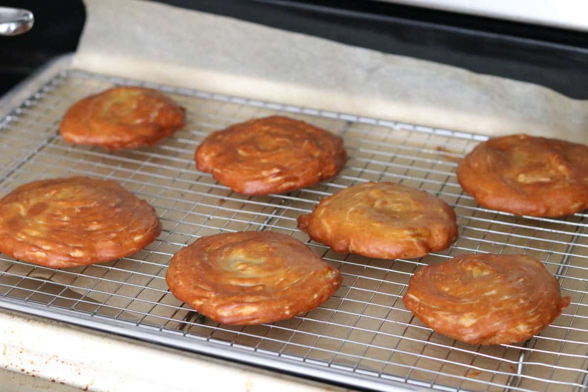 zeppole on a cooling rack