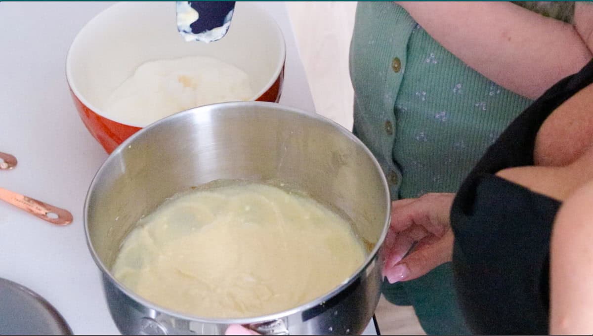 Kristin and Kat are transferring ingredients for ricotta timbale