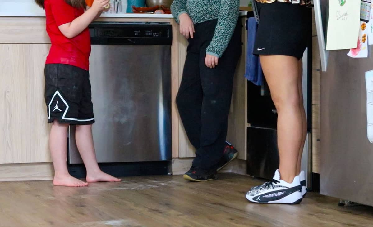Kat, Kaia, and Kristin hanging out in the kitchen