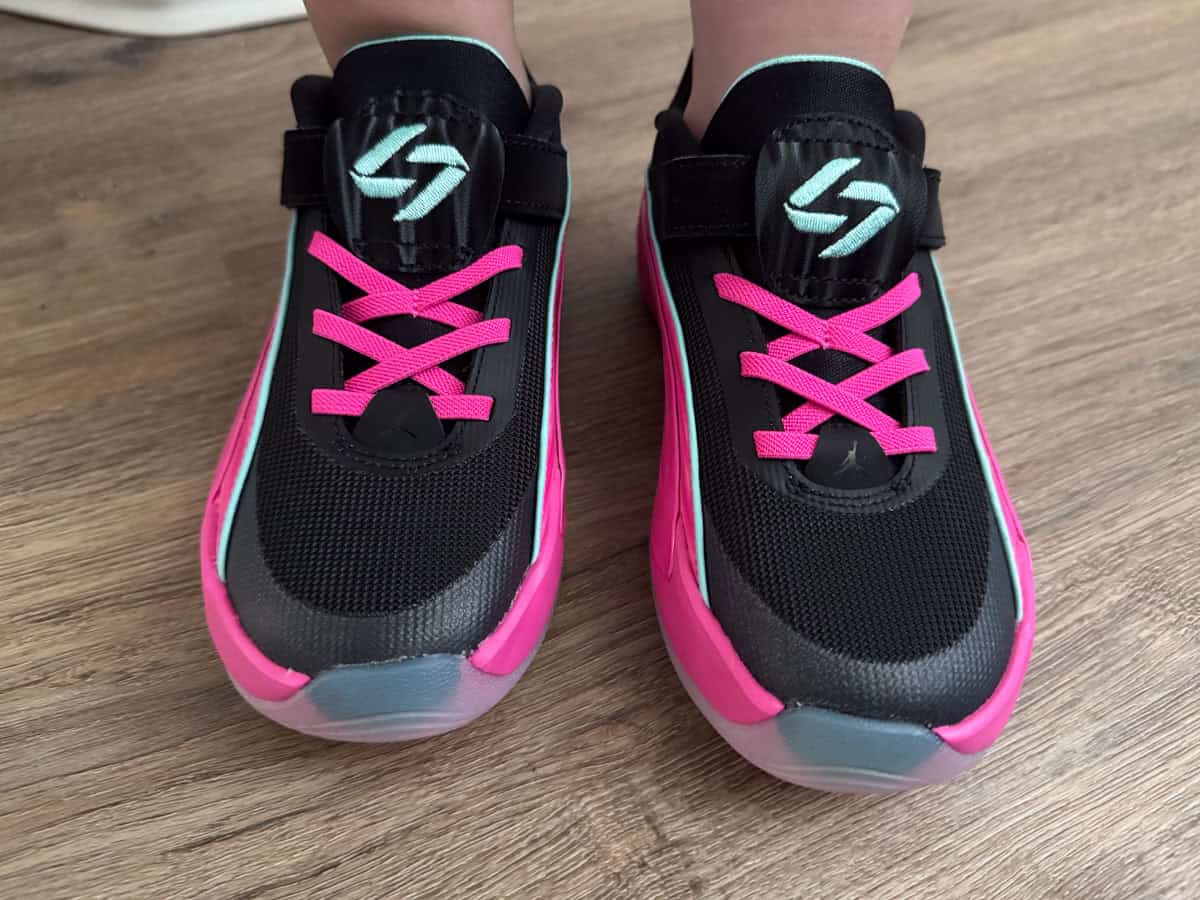 Kat is wearing the Luka 5 Night Drive in Little Kids