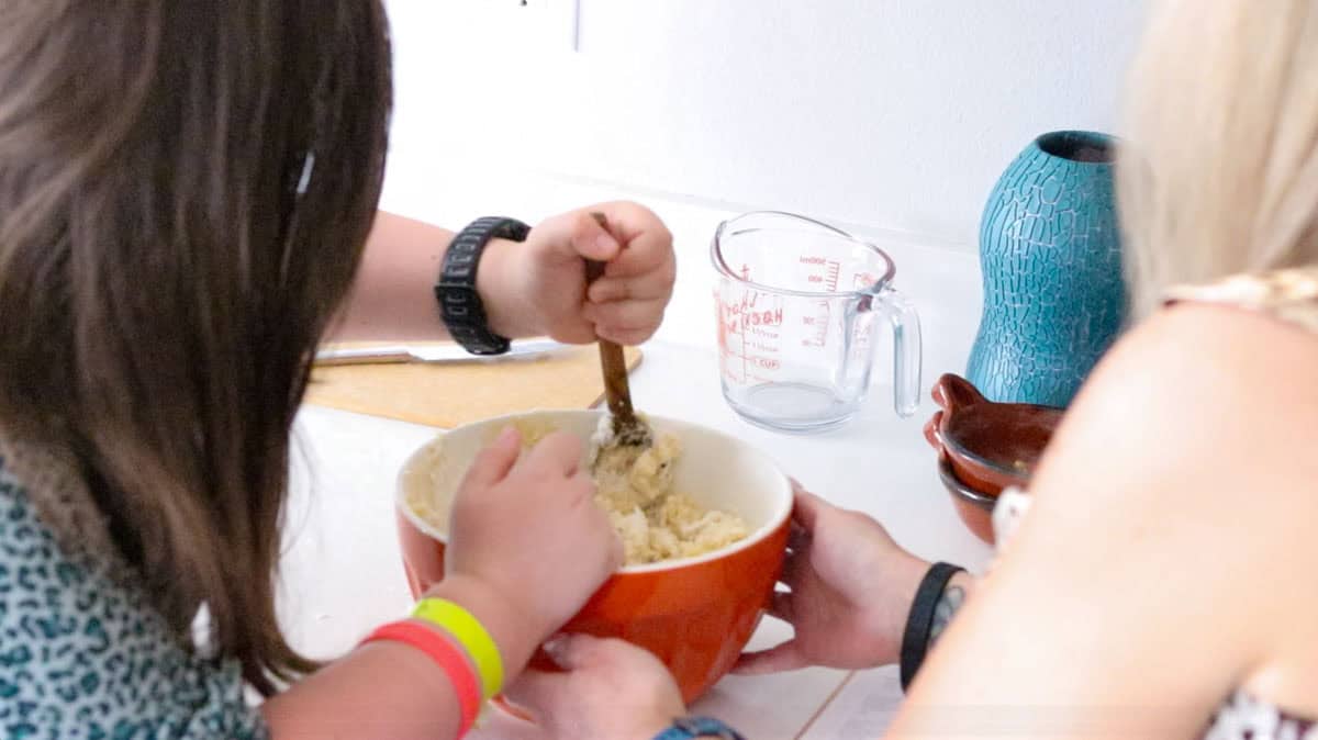 Kaia is combining flour with zeppole dough ingredients