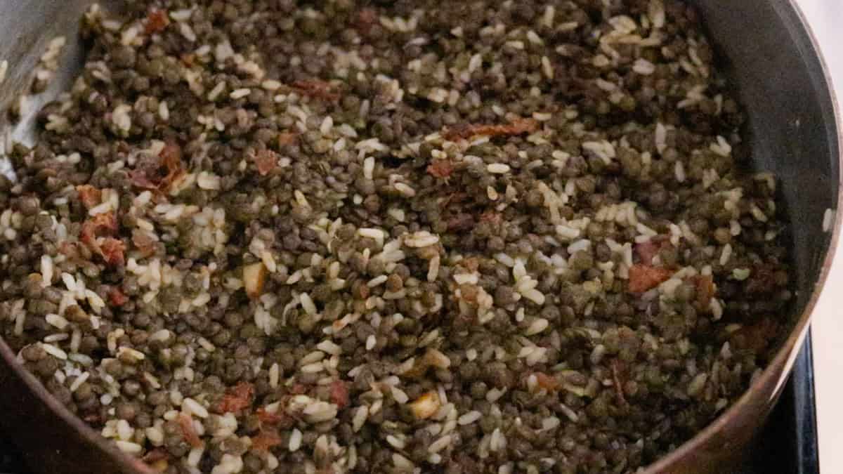 rice and lentil soup in a saucier
