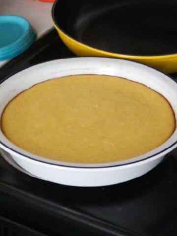 ricotta timbale in a pie dish on the stove