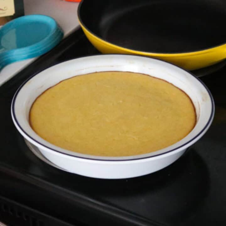 ricotta timbale in a pie dish on the stove
