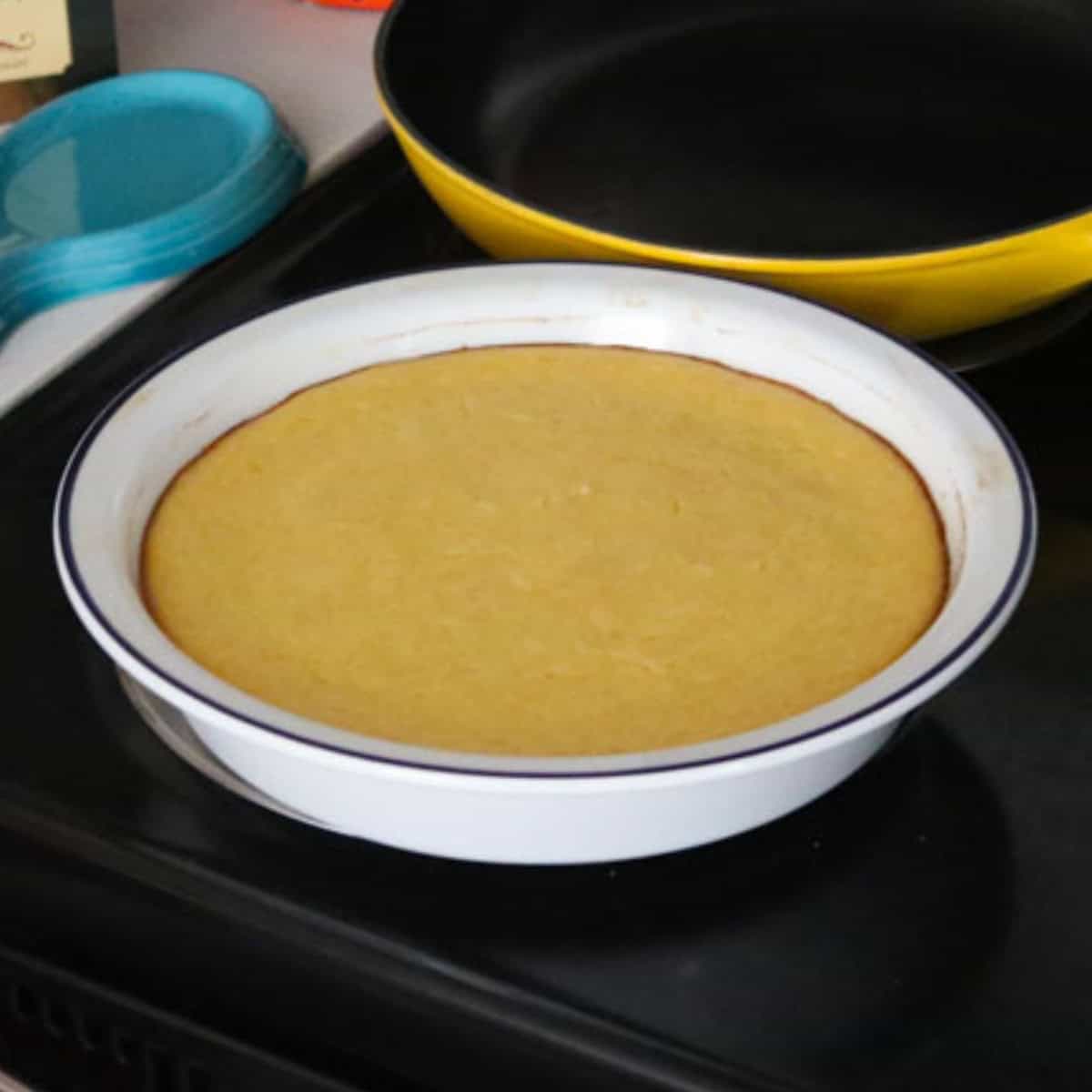 ricotta timbale in a pie dish on the stove