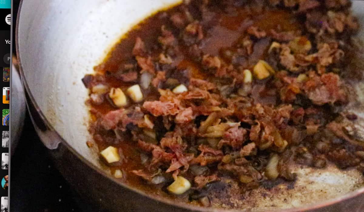 soffrito for rice and lentil soup in a saucier