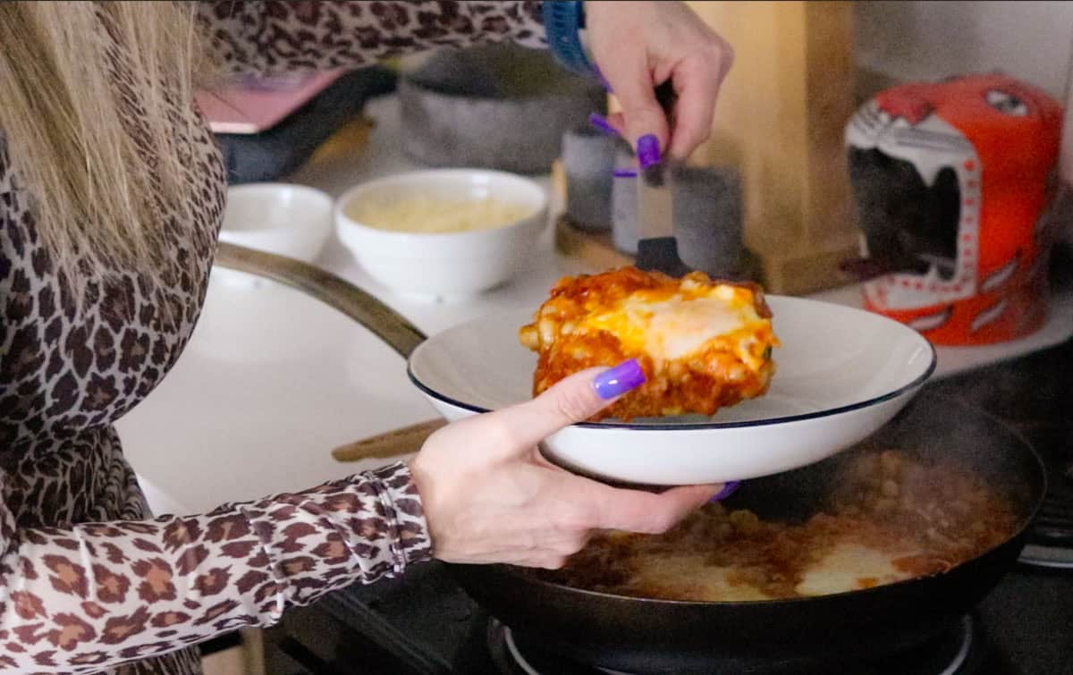 Kristin is serving eggs and beans in purgatory