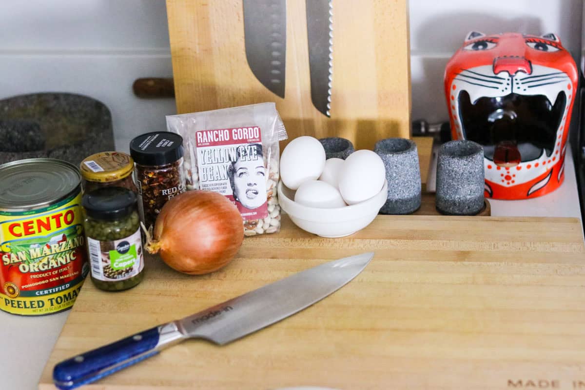 ingredients for making eggs and beans in purgatory