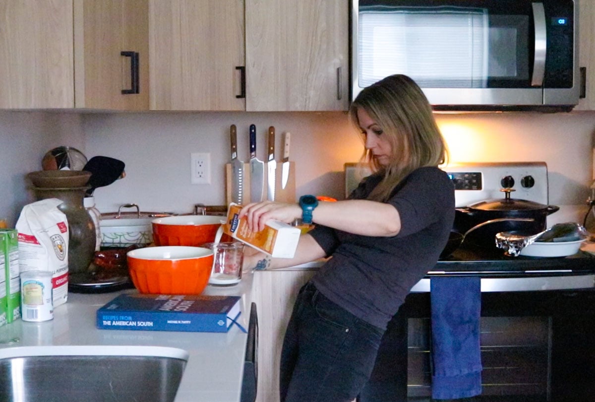Kristin is measuring buttermilk for corn dumplings