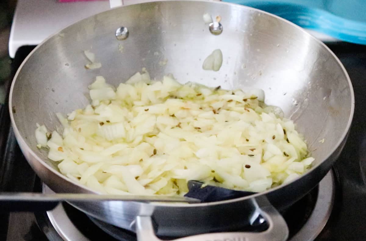 cooking onions in a kadai