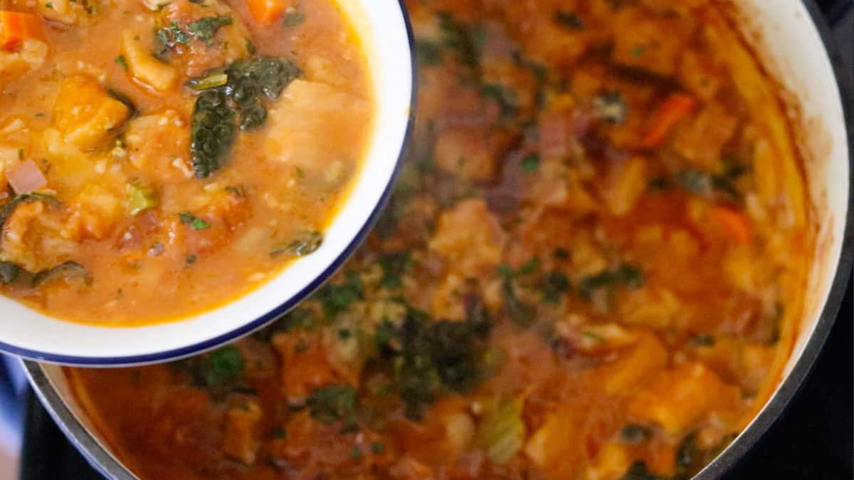 Siena-style ribollita in a bowl and in a Dutch oven