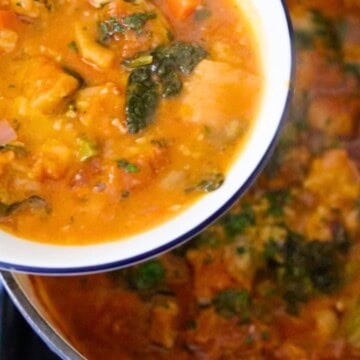 Siena-style ribollita in a bowl and in a Dutch oven