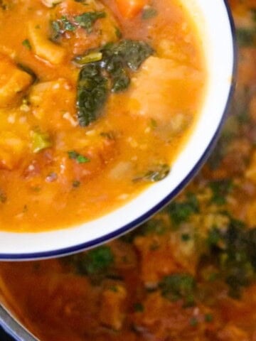 Siena-style ribollita in a bowl and in a Dutch oven