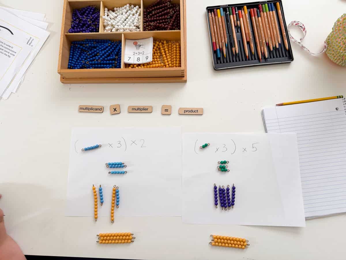 the associative property of multiplication using Montessori bead bars