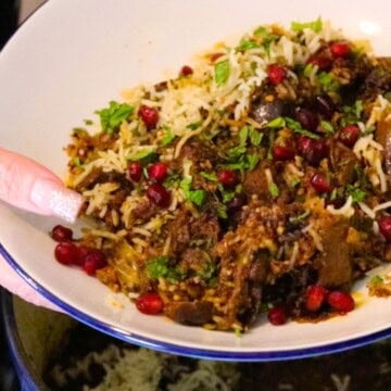 lamb biryani with black masala and figs plated