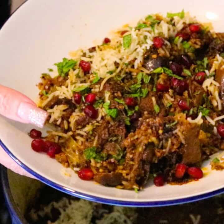 lamb biryani with black masala and figs plated