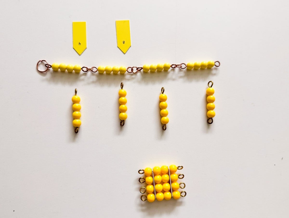Montessori 4 bead chain with labels and a 4 bead square