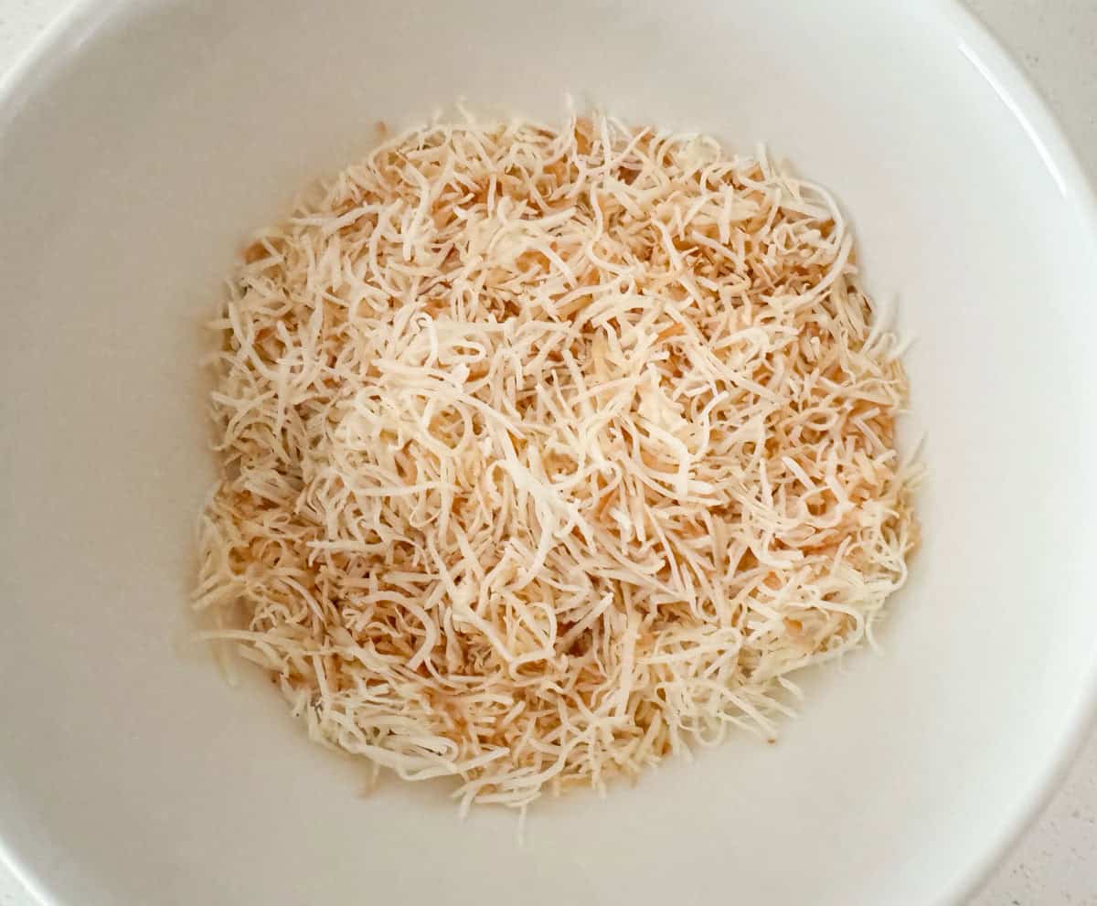 pan-roasted dessicated coconut in a bowl