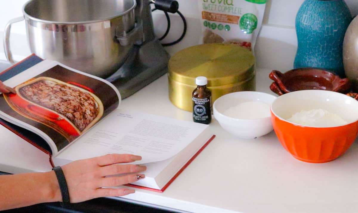 Kristin is looking at the new york crumb cake recipe in the cookie that changed my life