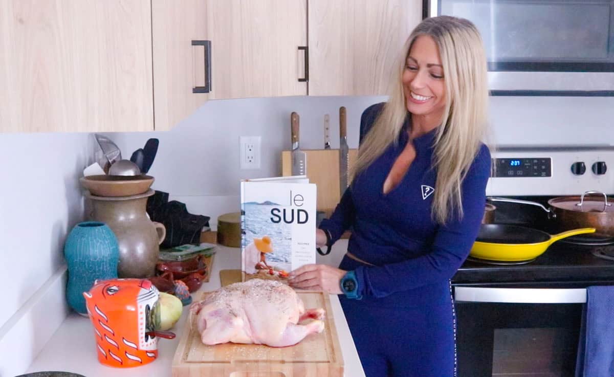 Kristin is smiling at Kat's setup for the chicken