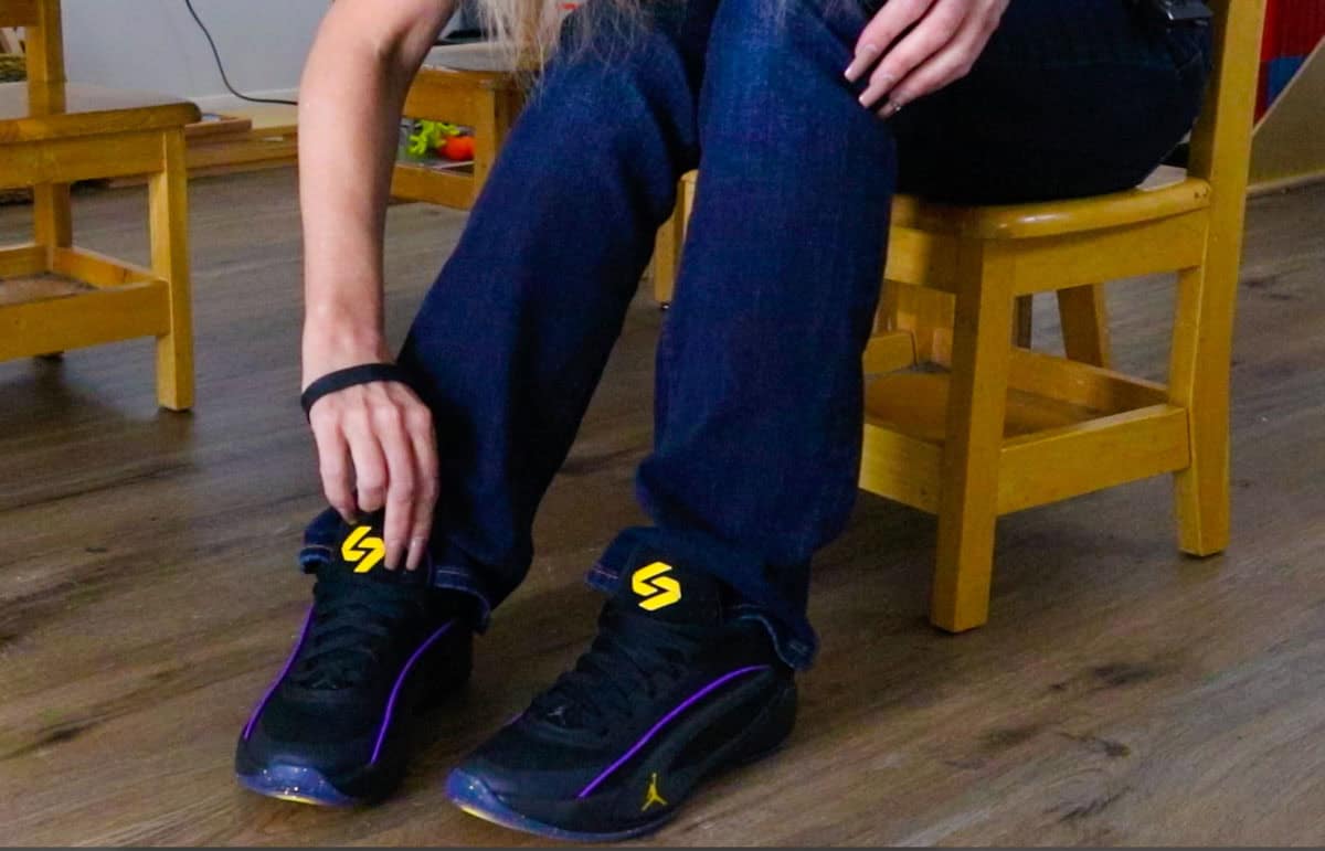 Kristin is adjusting the Luka 5 Purple Venom