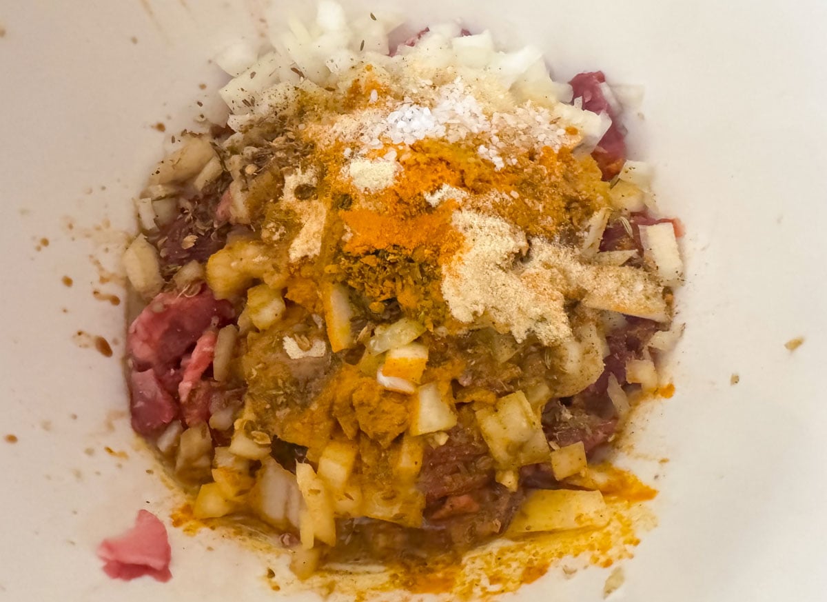 goat lo mein marinade ingredients in a bowl