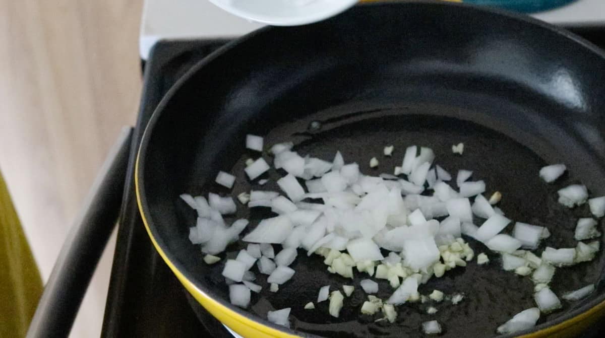 onion and garlic in an enameled cast iron skillet